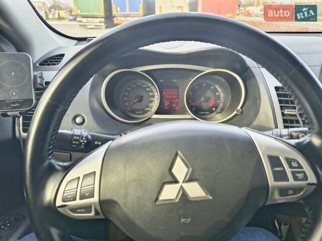 Черный Мицубиси Аутлендер, объемом двигателя 2.4 л и пробегом 238 тыс. км за 8900 $, фото 12 на Automoto.ua