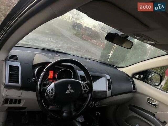 Черный Мицубиси Аутлендер, объемом двигателя 2.2 л и пробегом 310 тыс. км за 9700 $, фото 17 на Automoto.ua