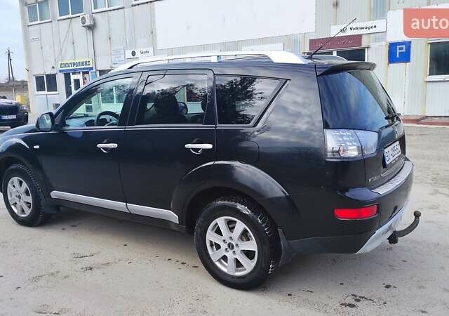 Чорний Міцубісі Аутлендер, об'ємом двигуна 2.2 л та пробігом 275 тис. км за 9900 $, фото 4 на Automoto.ua