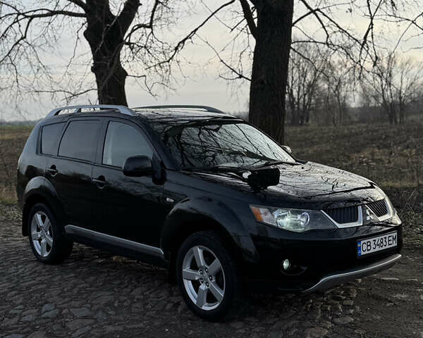 Чорний Міцубісі Аутлендер, об'ємом двигуна 2.36 л та пробігом 293 тис. км за 7900 $, фото 6 на Automoto.ua