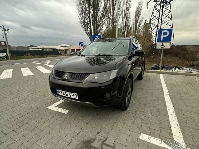 Чорний Міцубісі Аутлендер, об'ємом двигуна 2.4 л та пробігом 218 тис. км за 10000 $, фото 11 на Automoto.ua