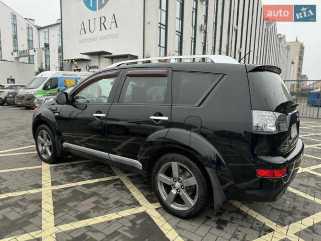 Черный Мицубиси Аутлендер, объемом двигателя 2.36 л и пробегом 120 тыс. км за 10100 $, фото 7 на Automoto.ua