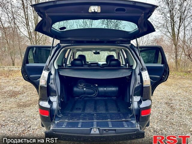 Черный Мицубиси Аутлендер, объемом двигателя 2.4 л и пробегом 229 тыс. км за 9790 $, фото 13 на Automoto.ua