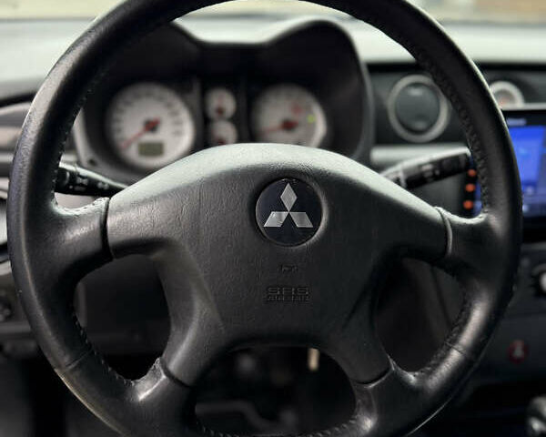 Черный Мицубиси Аутлендер, объемом двигателя 2.4 л и пробегом 245 тыс. км за 6500 $, фото 10 на Automoto.ua