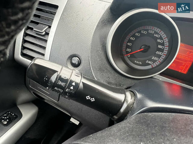 Мицубиси Аутлендер 2008 в Кременчуге на Automoto.ua Черный Мицубиси Аутлендер, объемом двигателя 2.4 л и пробегом 230 тыс. км за 6850 $, фото 31 на Automoto.ua