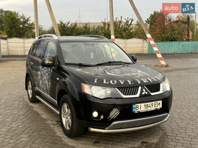 Мицубиси Аутлендер 2008 в Кременчуге на Automoto.ua Черный Мицубиси Аутлендер, объемом двигателя 2.4 л и пробегом 230 тыс. км за 6850 $, фото 68 на Automoto.ua