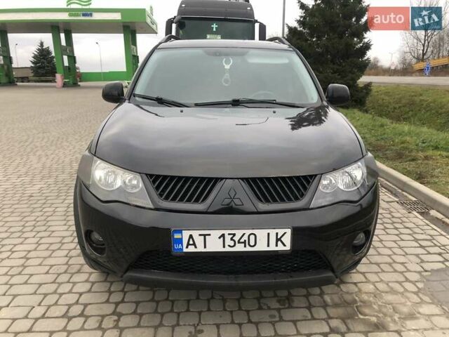Чорний Міцубісі Аутлендер, об'ємом двигуна 2.4 л та пробігом 199 тис. км за 8999 $, фото 4 на Automoto.ua