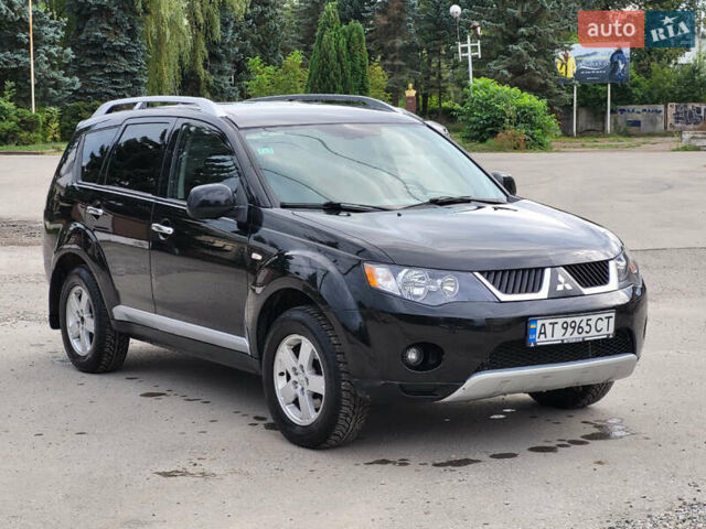 Чорний Міцубісі Аутлендер, об'ємом двигуна 2.4 л та пробігом 205 тис. км за 8400 $, фото 2 на Automoto.ua