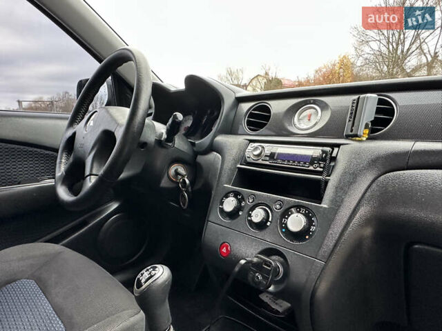 Чорний Міцубісі Аутлендер, об'ємом двигуна 2 л та пробігом 118 тис. км за 8100 $, фото 36 на Automoto.ua