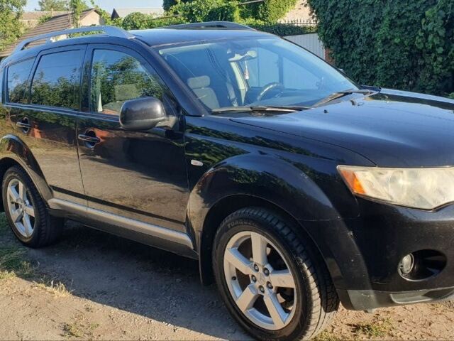 Чорний Міцубісі Аутлендер, об'ємом двигуна 2.4 л та пробігом 325 тис. км за 7500 $, фото 15 на Automoto.ua