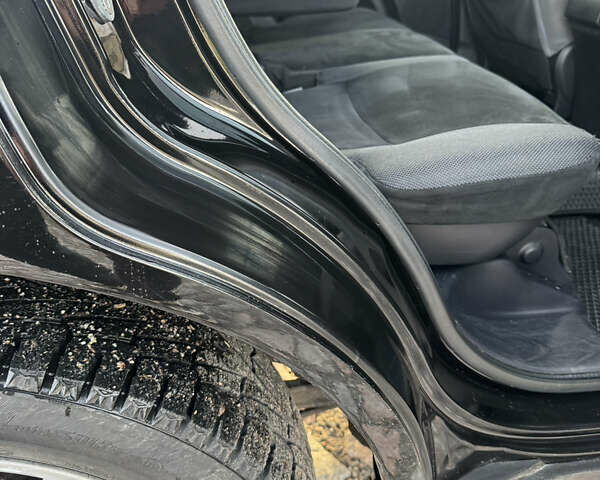 Чорний Міцубісі Аутлендер, об'ємом двигуна 2.36 л та пробігом 293 тис. км за 7900 $, фото 16 на Automoto.ua