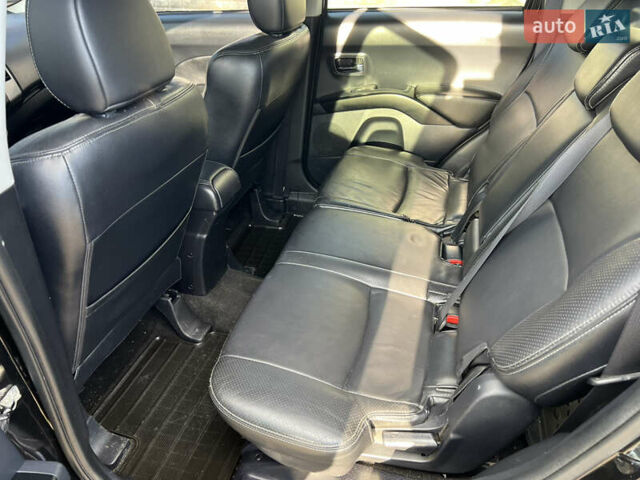 Чорний Міцубісі Аутлендер, об'ємом двигуна 2.4 л та пробігом 221 тис. км за 8700 $, фото 21 на Automoto.ua