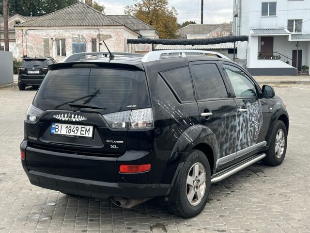 Міцубісі Аутлендер 2008 у Кременчуге на Automoto.ua Чорний Міцубісі Аутлендер, об'ємом двигуна 2.4 л та пробігом 230 тис. км за 6850 $, фото 4 на Automoto.ua