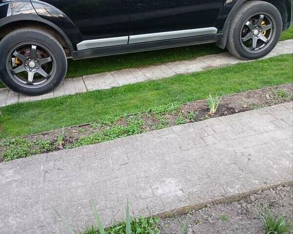 Черный Мицубиси Аутлендер, объемом двигателя 2.35 л и пробегом 245 тыс. км за 8000 $, фото 29 на Automoto.ua