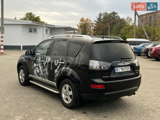 Мицубиси Аутлендер 2008 в Кременчуге на Automoto.ua Черный Мицубиси Аутлендер, объемом двигателя 2.4 л и пробегом 230 тыс. км за 6850 $, фото 9 на Automoto.ua
