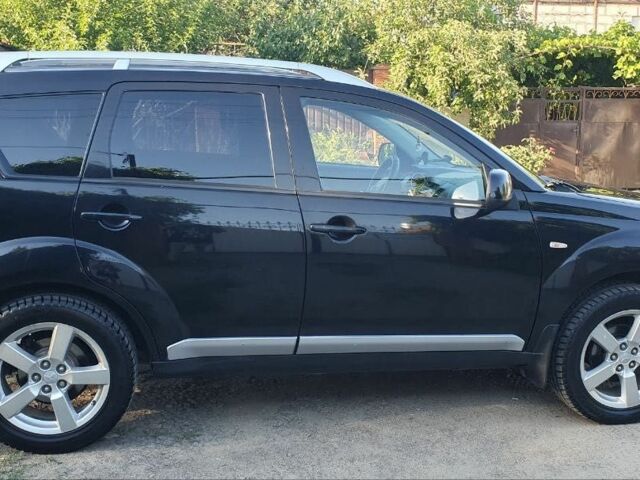 Чорний Міцубісі Аутлендер, об'ємом двигуна 2.4 л та пробігом 325 тис. км за 7500 $, фото 13 на Automoto.ua