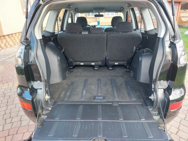 Черный Мицубиси Аутлендер, объемом двигателя 2 л и пробегом 249 тыс. км за 8750 $, фото 12 на Automoto.ua