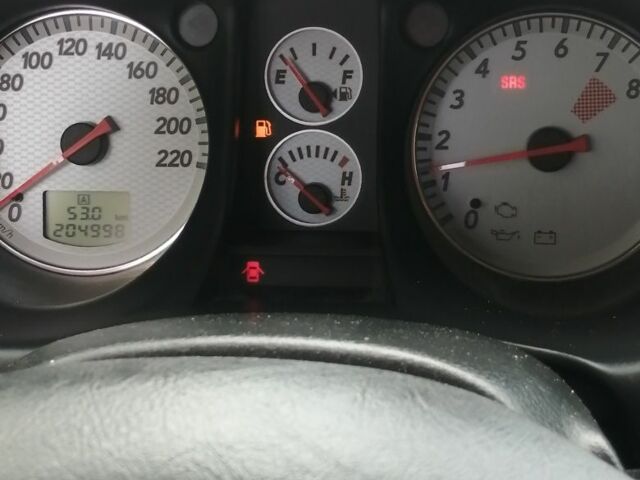 Чорний Міцубісі Аутлендер, об'ємом двигуна 2 л та пробігом 208 тис. км за 6700 $, фото 8 на Automoto.ua