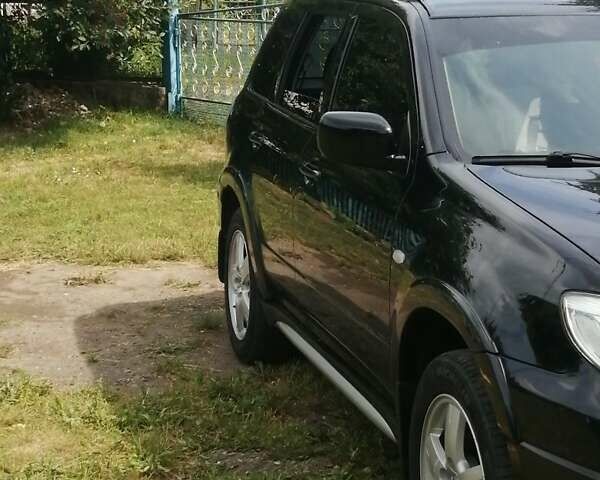 Чорний Міцубісі Аутлендер, об'ємом двигуна 2 л та пробігом 208 тис. км за 6700 $, фото 5 на Automoto.ua