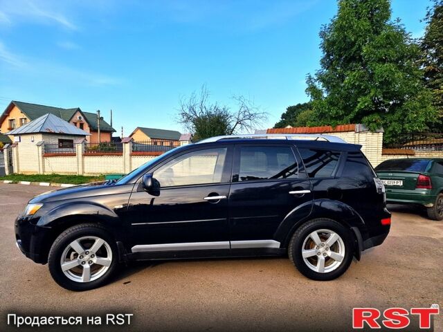 Черный Мицубиси Аутлендер, объемом двигателя 2.4 л и пробегом 189 тыс. км за 7000 $, фото 7 на Automoto.ua