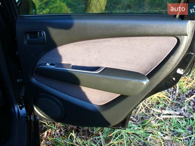 Черный Мицубиси Аутлендер, объемом двигателя 2 л и пробегом 189 тыс. км за 7200 $, фото 57 на Automoto.ua