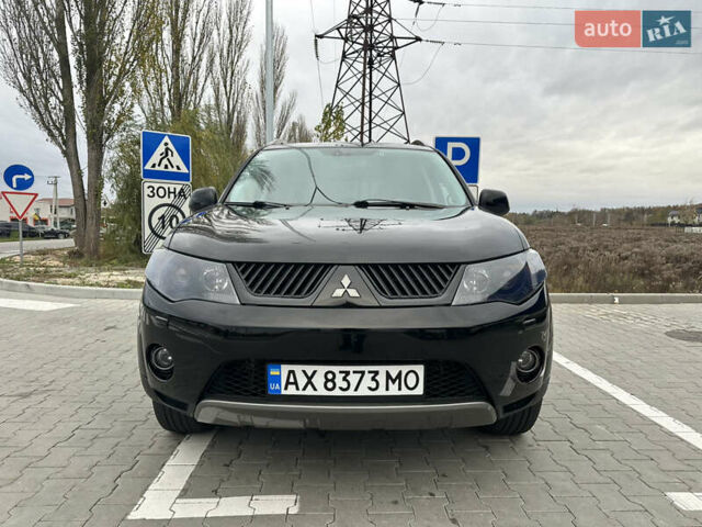 Чорний Міцубісі Аутлендер, об'ємом двигуна 2.4 л та пробігом 218 тис. км за 10000 $, фото 8 на Automoto.ua