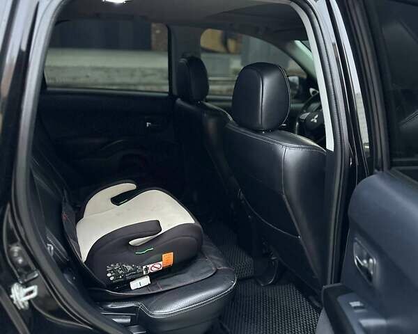 Черный Мицубиси Аутлендер, объемом двигателя 3 л и пробегом 248 тыс. км за 9800 $, фото 37 на Automoto.ua