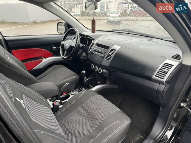 Мицубиси Аутлендер 2008 в Кременчуге на Automoto.ua Черный Мицубиси Аутлендер, объемом двигателя 2.4 л и пробегом 230 тыс. км за 6850 $, фото 51 на Automoto.ua
