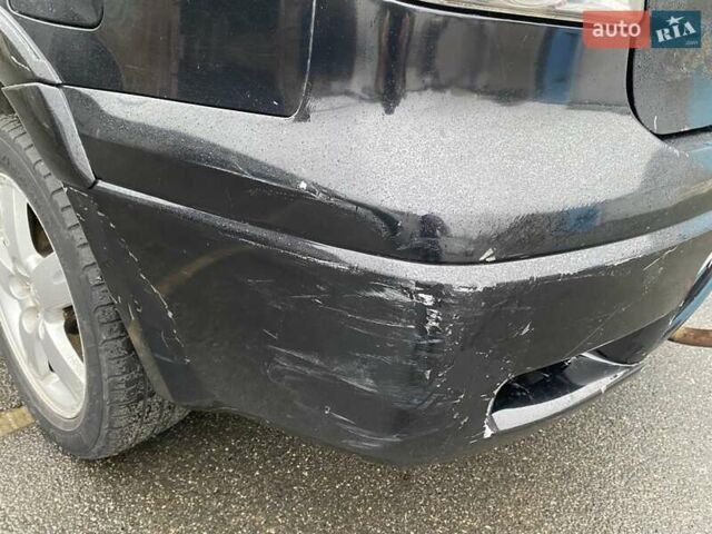 Черный Мицубиси Аутлендер, объемом двигателя 2 л и пробегом 306 тыс. км за 6500 $, фото 22 на Automoto.ua