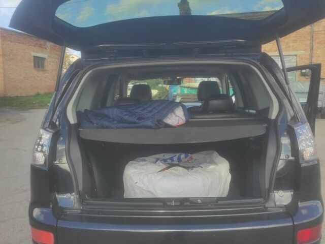 Черный Мицубиси Аутлендер, объемом двигателя 3 л и пробегом 300 тыс. км за 9000 $, фото 4 на Automoto.ua