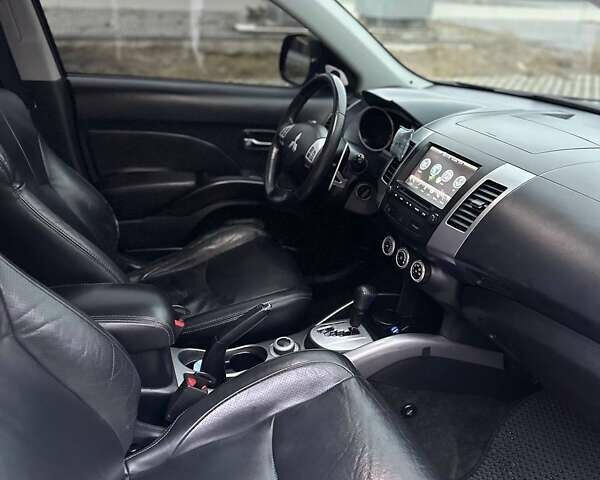 Черный Мицубиси Аутлендер, объемом двигателя 3 л и пробегом 248 тыс. км за 9800 $, фото 39 на Automoto.ua