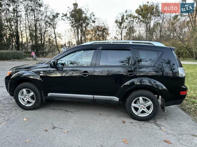 Чорний Міцубісі Аутлендер, об'ємом двигуна 1.97 л та пробігом 300 тис. км за 8600 $, фото 6 на Automoto.ua