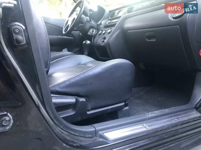 Чорний Міцубісі Аутлендер, об'ємом двигуна 2.38 л та пробігом 207 тис. км за 7000 $, фото 76 на Automoto.ua
