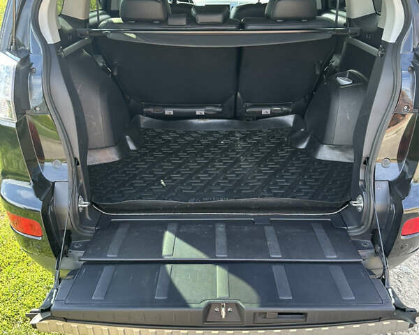 Черный Мицубиси Аутлендер, объемом двигателя 2.36 л и пробегом 240 тыс. км за 9599 $, фото 15 на Automoto.ua