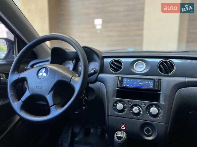 Черный Мицубиси Аутлендер, объемом двигателя 2 л и пробегом 270 тыс. км за 7199 $, фото 40 на Automoto.ua