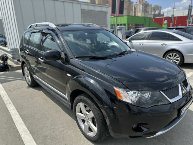 Чорний Міцубісі Аутлендер, об'ємом двигуна 2.4 л та пробігом 137 тис. км за 8700 $, фото 2 на Automoto.ua