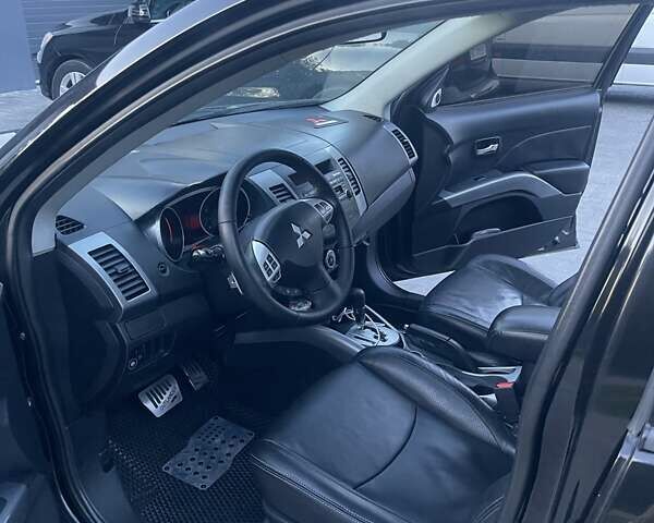 Черный Мицубиси Аутлендер, объемом двигателя 2.4 л и пробегом 290 тыс. км за 9500 $, фото 20 на Automoto.ua