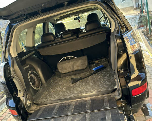 Черный Мицубиси Аутлендер, объемом двигателя 2.36 л и пробегом 253 тыс. км за 9600 $, фото 12 на Automoto.ua