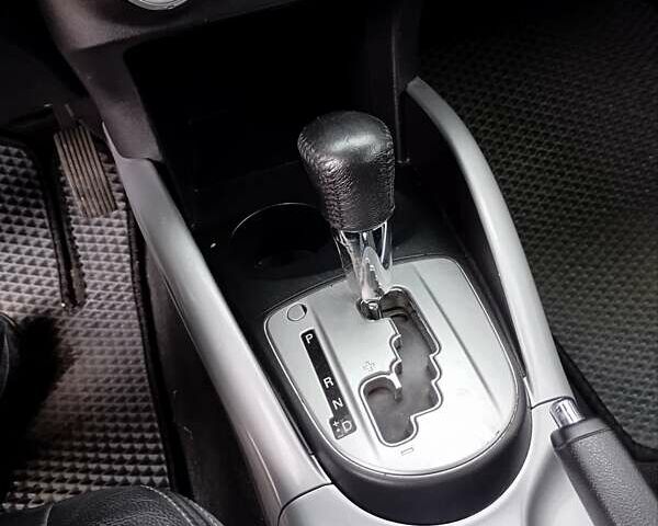 Чорний Міцубісі Аутлендер, об'ємом двигуна 2.36 л та пробігом 265 тис. км за 8800 $, фото 12 на Automoto.ua