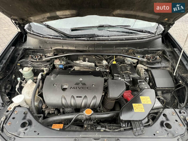 Міцубісі Аутлендер 2008 у Кременчуге на Automoto.ua Чорний Міцубісі Аутлендер, об'ємом двигуна 2.4 л та пробігом 230 тис. км за 6650 $, фото 63 на Automoto.ua