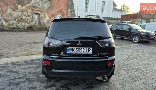 Чорний Міцубісі Аутлендер, об'ємом двигуна 2.4 л та пробігом 230 тис. км за 9700 $, фото 5 на Automoto.ua