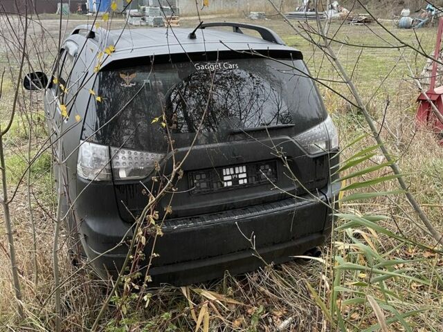 Черный Мицубиси Аутлендер, объемом двигателя 2 л и пробегом 360 тыс. км за 2000 $, фото 3 на Automoto.ua