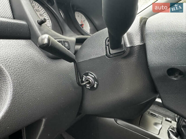 Чорний Міцубісі Аутлендер, об'ємом двигуна 2 л та пробігом 254 тис. км за 7499 $, фото 12 на Automoto.ua