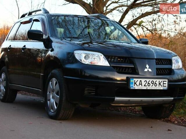 Черный Мицубиси Аутлендер, объемом двигателя 2 л и пробегом 189 тыс. км за 7200 $, фото 3 на Automoto.ua