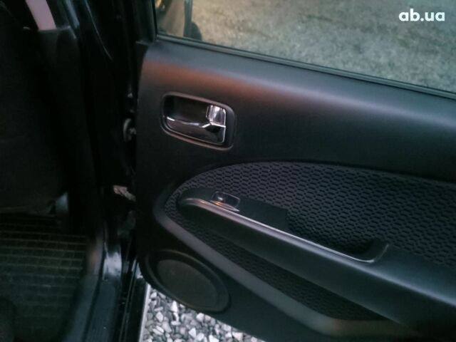 Черный Мицубиси Аутлендер, объемом двигателя 2 л и пробегом 271 тыс. км за 6940 $, фото 19 на Automoto.ua