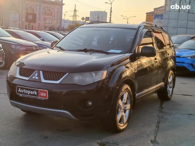 Черный Мицубиси Аутлендер, объемом двигателя 2.4 л и пробегом 190 тыс. км за 7990 $, фото 2 на Automoto.ua