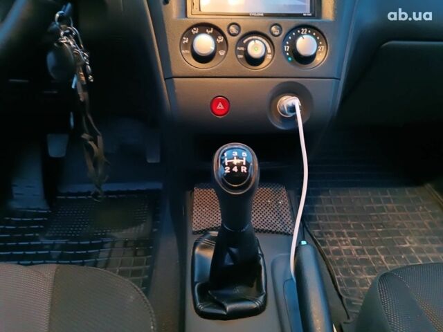 Черный Мицубиси Аутлендер, объемом двигателя 2 л и пробегом 271 тыс. км за 6940 $, фото 26 на Automoto.ua