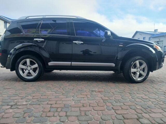 Чорний Міцубісі Аутлендер, об'ємом двигуна 3 л та пробігом 300 тис. км за 9600 $, фото 9 на Automoto.ua