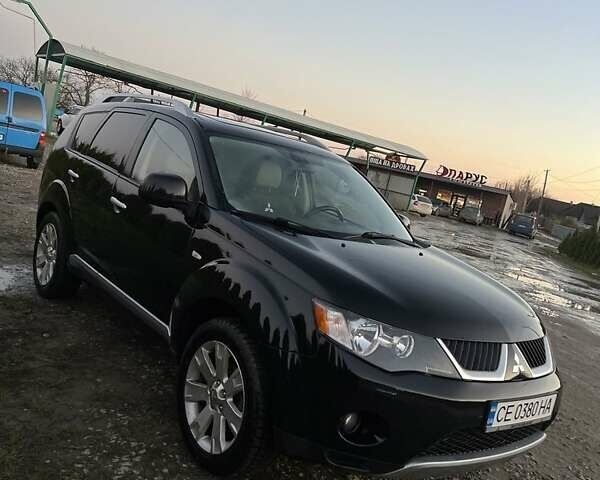 Черный Мицубиси Аутлендер, объемом двигателя 2.2 л и пробегом 310 тыс. км за 9700 $, фото 4 на Automoto.ua
