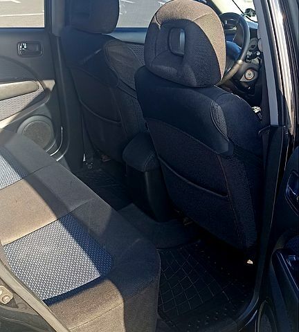 Чорний Міцубісі Аутлендер, об'ємом двигуна 2 л та пробігом 364 тис. км за 5900 $, фото 6 на Automoto.ua